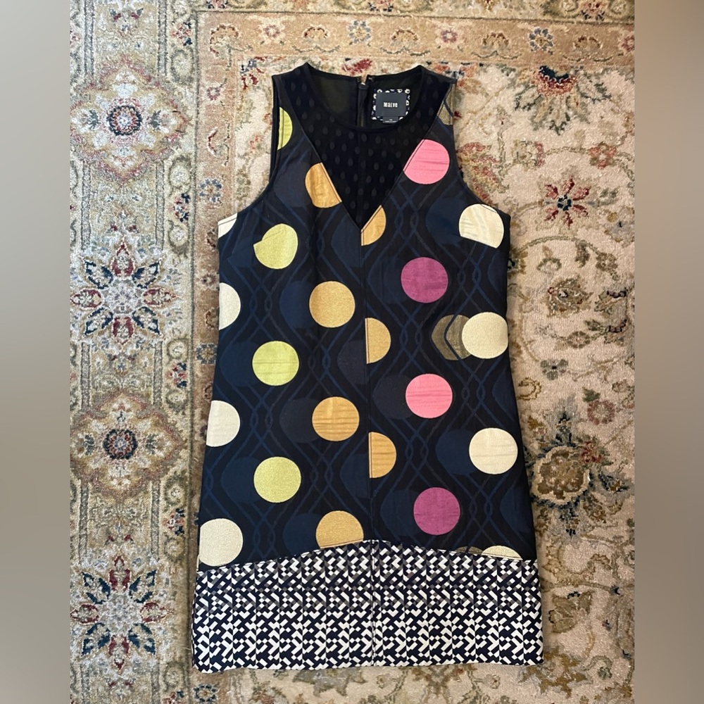 XS dress. Anthropologie. Mid length Summer fits loose condition is very good
